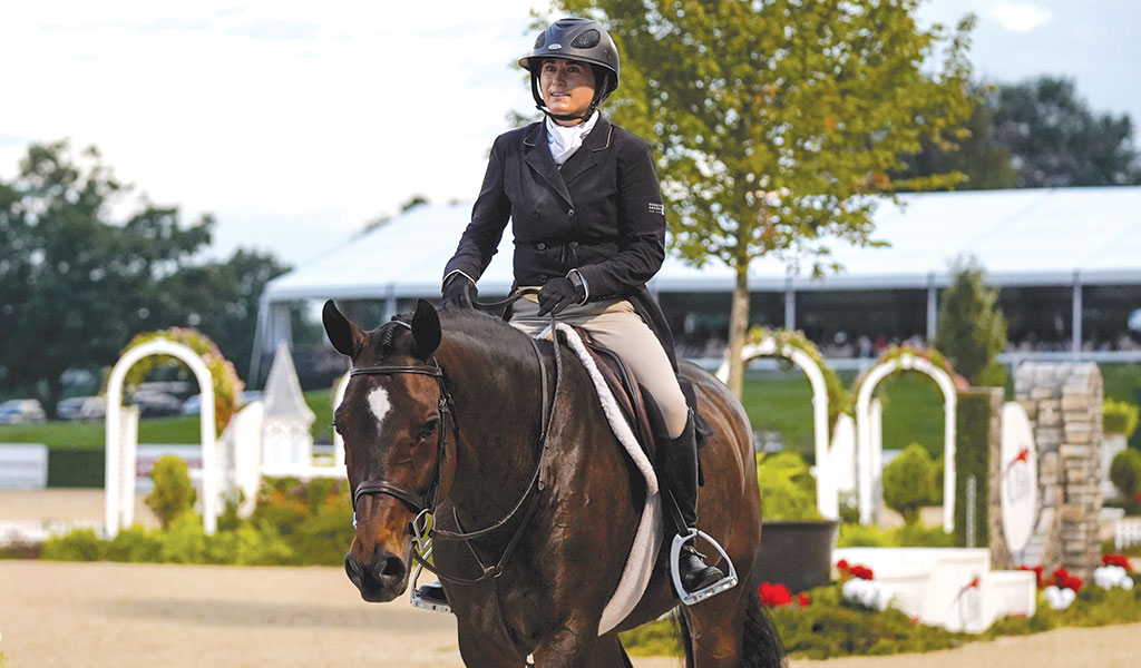 Victoria Colvin seated on a horse in riding attire